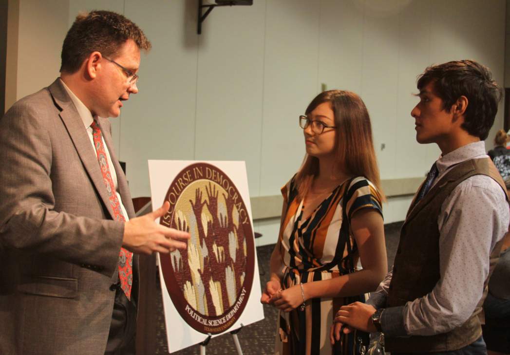 Students Speak with Whittington after lecture